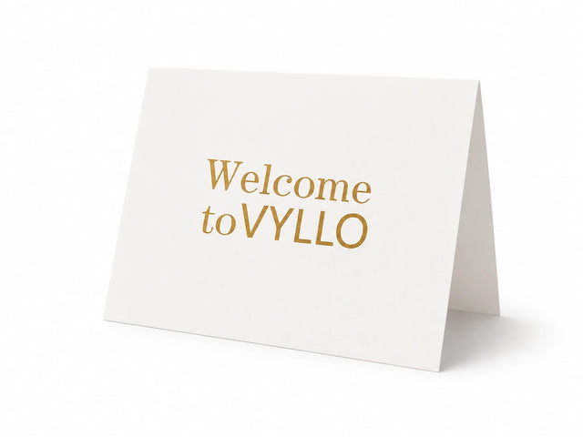VYLLO welcome card with gold lettering